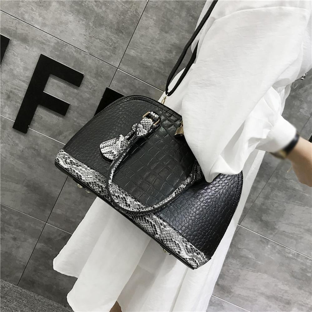 sac cuir serpent noir